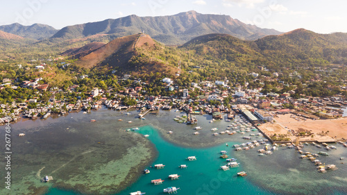 Sign of the city of Coron on the hill. Palawan Busuanga.Cross on hill, sign of the city of Coron tourist place. Aerial view Catholic cross on mountain Philippines,Palawan Busuanga .Travel concept.