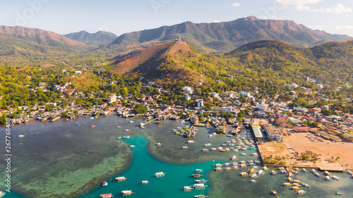 Sign of the city of Coron on the hill. Palawan Busuanga.Cross on hill, sign of the city of Coron tourist place. Aerial view Catholic cross on mountain Philippines,Palawan Busuanga .Travel concept.