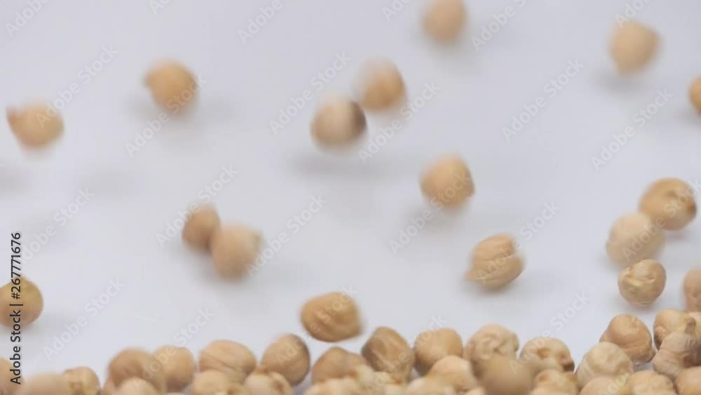 chickpea on white background falling from top and filling up frame. slow motion 96fps chickpea on white background falling from top and filling up frame. slow motion 96fps