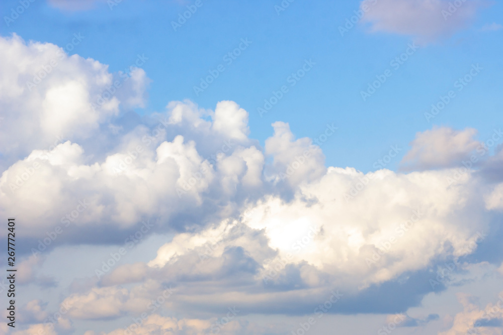 Beautiful gloomy blue sky with fluffy clouds in summer morning peace day as a background. Gray, white and turquoise color blured skyline photography. Beautiful gloomy blue sky with fluffy clouds in summer morning peace day as a background. Gray, white and turquoise color blured skyline photography.