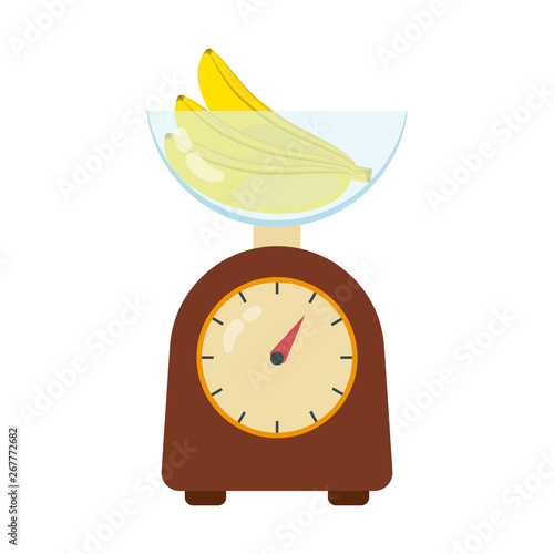 Weighing banana on kitchen scales. The concept of weighing fruit, banana on the kitchen scales. Cookery, healthy food, grocery shopping.