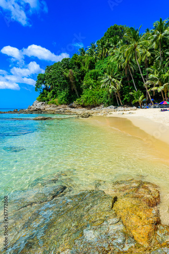 Surin beach, Paradise beach with golden sand, crystal water and palm trees, Patong area on Phuket Island, Tropical travel destination, Thailand © Simon Dannhauer