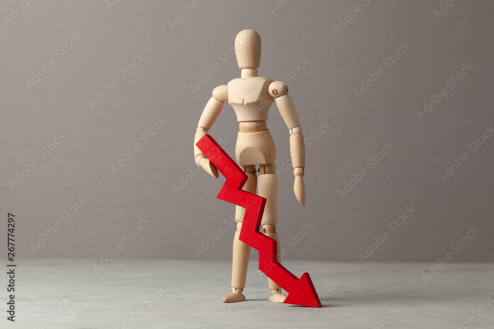 Businessman holds red down arrow chart. Drop in profitability or bankruptcy, decline in income. Businessman holds red down arrow chart. Drop in profitability or bankruptcy, decline in income.