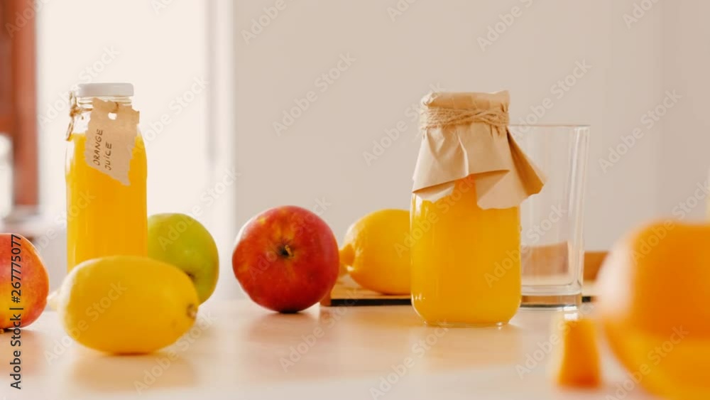 Slider shot of fresh fruit juice glass bottles. Vegetarian eating habit. Healthy nutrition weight loss lifestyle. Cleanse products. Slider shot of fresh fruit juice glass bottles. Vegetarian eating habit. Healthy nutrition weight loss lifestyle. Cleanse products.
