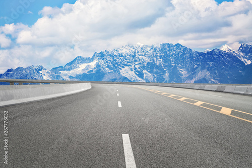 Empty highways and distant mountains