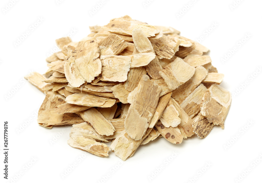 Chinese Herbal medicine - Astragalus slices, Huang Qi (Astragalus propinquus) on white background Chinese Herbal medicine - Astragalus slices, Huang Qi (Astragalus propinquus) on white background