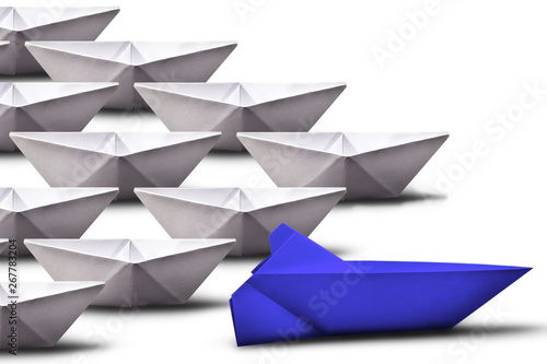 paper boats alone in Indian queue  white background. Concept of unity and teamwork