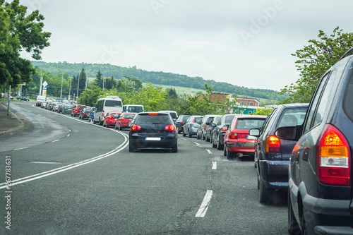 congestion. traffic jam on the road. many cars on the street. morning traffic jam. rush hour. return from work with a car. 