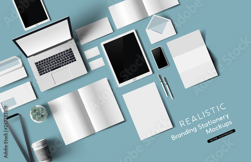 Top down view of office desk realistic stationery and objects. Vector mockup illustration.