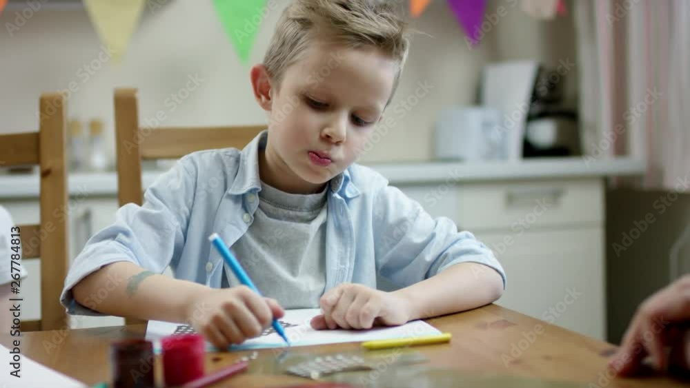 boy draw correct picture with a pen with flow camera boy draw correct picture with a pen with flow camera