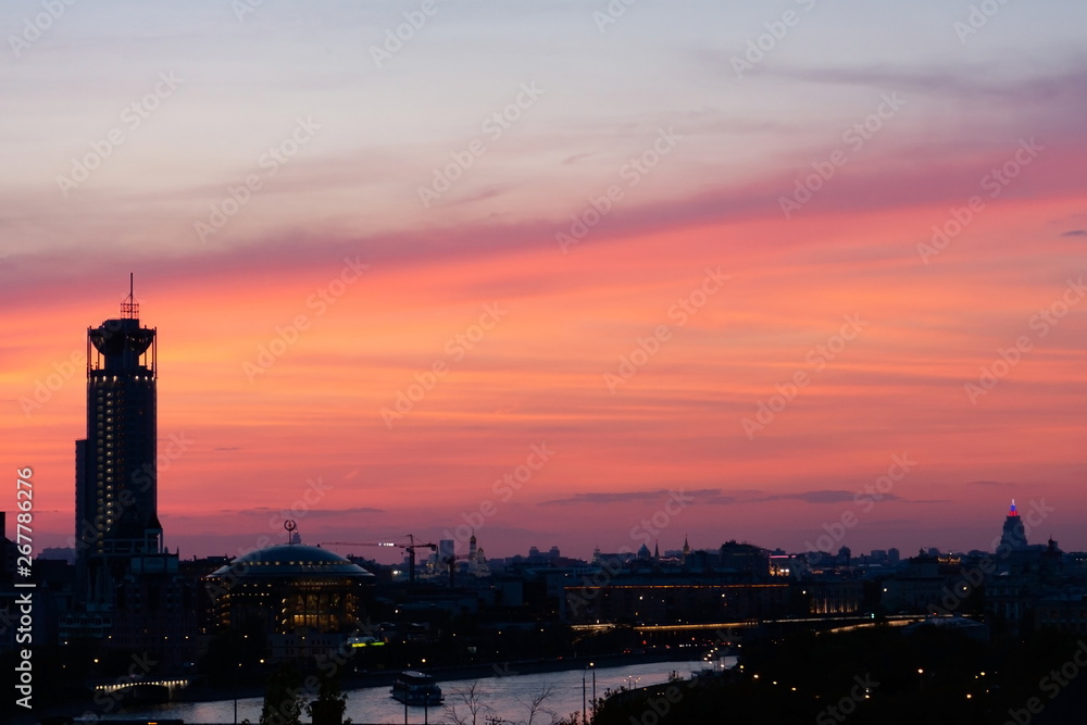 Pink sunset in a major city. Moscow