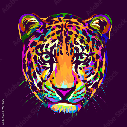 Abstract, multi-colored portrait of a Jaguar looking forward on a purple background.