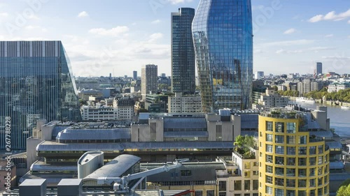 Panoramic view of south bank of the river Thames, One Blackfriars tower, Bankside Lofts and roof of Sampson House in the foreground. Time lapse, London, UK. photo