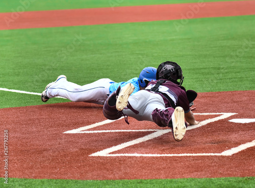 Photography Young athletic boys playing sport of baseball
