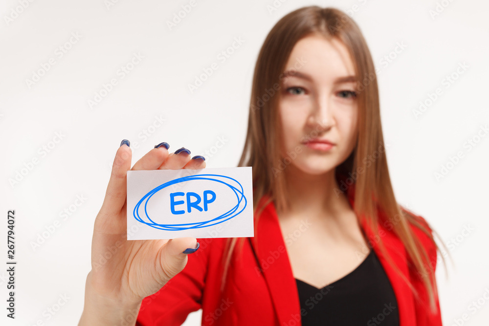 Business, technology, internet and networking concept. Young entrepreneur showing keyword: ERP Business, technology, internet and networking concept. Young entrepreneur showing keyword: ERP