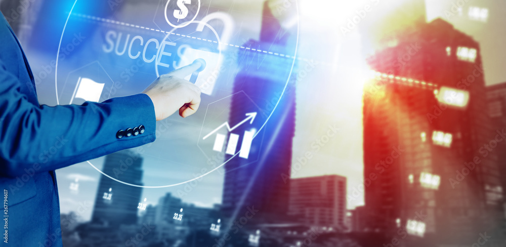 Business man point to success text hologram future concept. Business man point to success text hologram future concept.