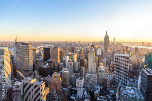 Panorama view of Midtown Manhattan skyline with the Empire State Building from the Rockefeller Center Observation Deck. Top of the Rock - New York City, USA © Simon Dannhauer