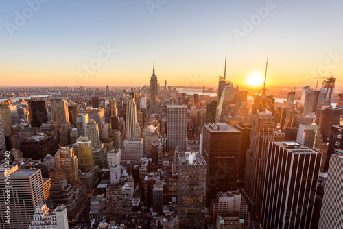 Panorama view of Midtown Manhattan skyline with the Empire State Building from the Rockefeller Center Observation Deck. Top of the Rock - New York City, USA © Simon Dannhauer