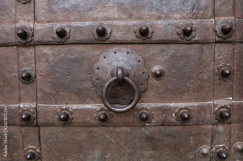 old metal ring on door metal door - Image