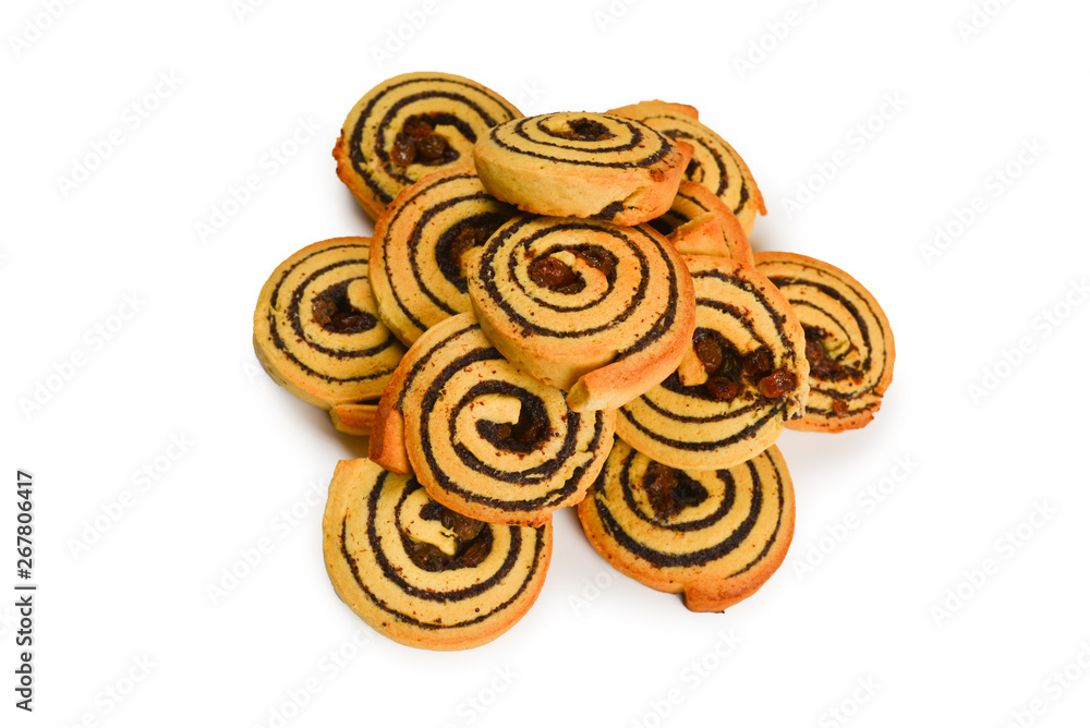 Fototapeta premium Baked cookies with raisins and poppy seeds isolated on white background.