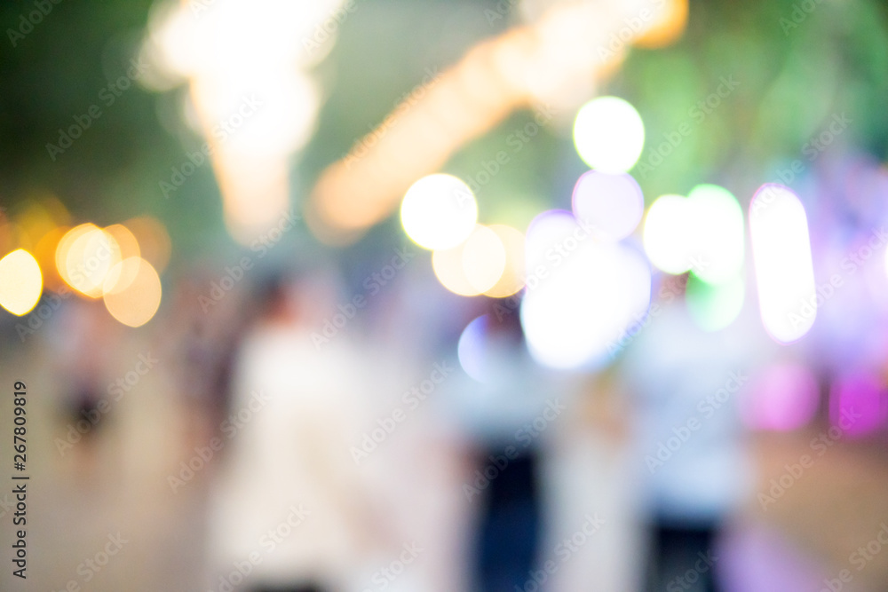 abstract blur image of food stall at night festival with bokeh for background usage abstract blur image of food stall at night festival with bokeh for background usage