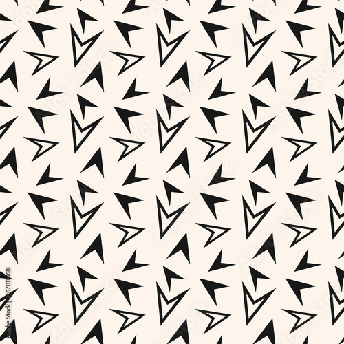 Black and white geometric seamless pattern with scattered triangles, arrows