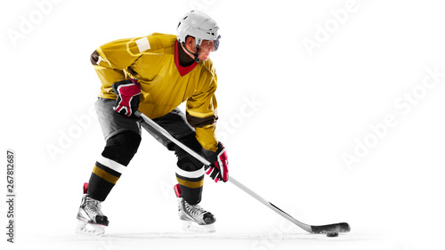 Photography Professional ice hockey player in action on white backgound