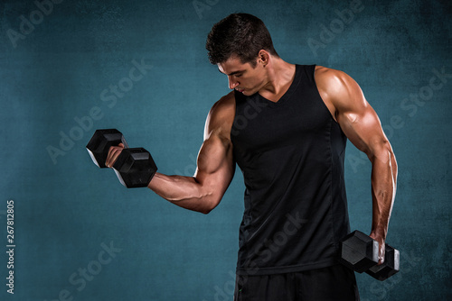 Handsome Athletic Men Exercise With Weights © mrbigphoto