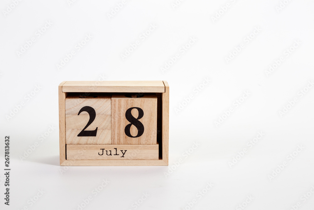 Wooden calendar July 28 on a white background Wooden calendar July 28 on a white background