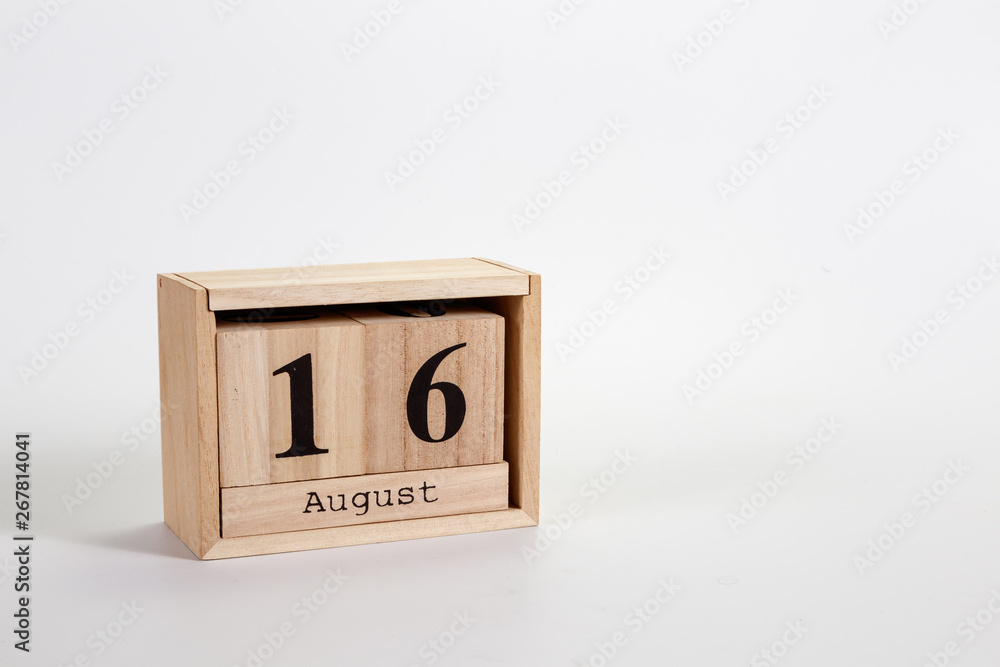 Wooden calendar August 16 on a white background Wooden calendar August 16 on a white background