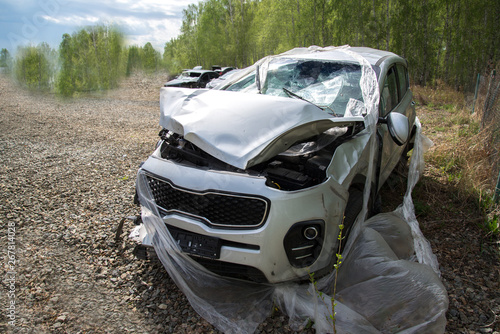 car after an accident in the parking lot, severe damage to the car after the accident, it is impossible to recover photo