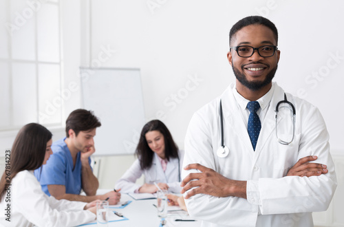 African Medical Doctor Looking At Camera During Conference
