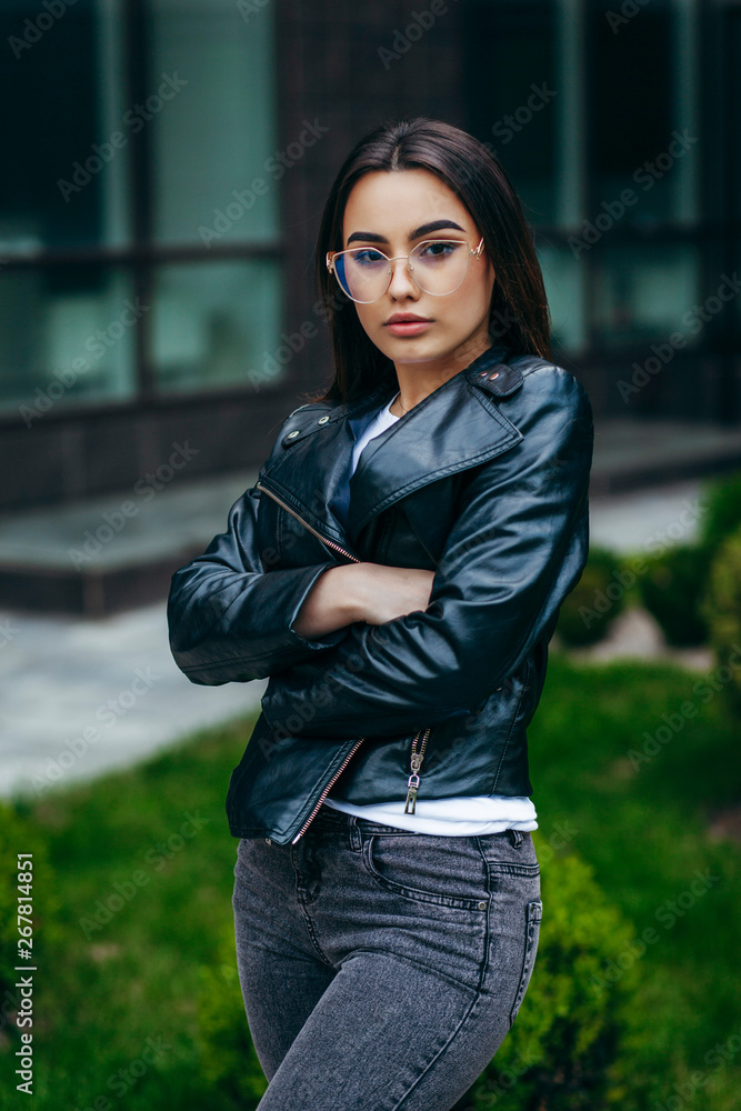 Stylish girl in a leather jacket