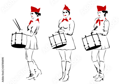 Young drummer in form of the Soviet pioneer on a white background