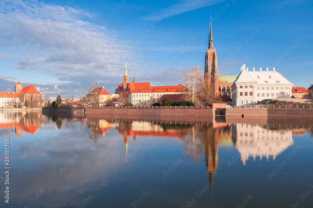 Cathedral of St. John the Baptist twin towers Odra river sunset Wroclaw, Poland, Europe