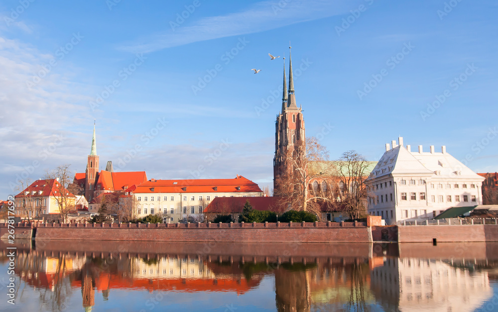 Obraz premium Cathedral of St. John the Baptist twin towers Odra river sunset Wroclaw, Poland, Europe