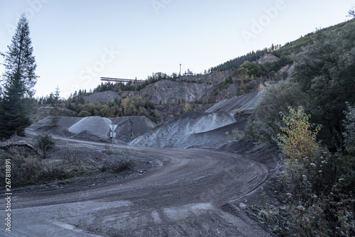 huge stone quarry above Maluzina village in Nizke Tatry mountains in Slovakia photo