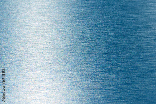 Abstract blue metallic background with gradient, texture closeup