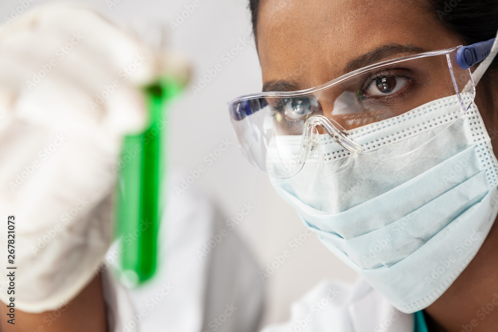 Asian Indian Female Scientist Researcher In Laboratory Asian Indian Female Scientist Researcher In Laboratory