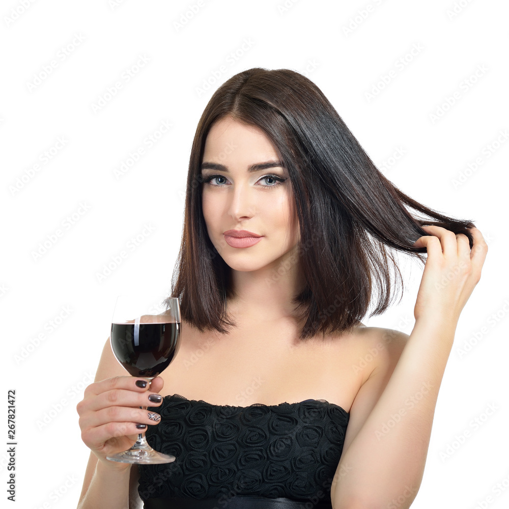 Young attractive woman holding glass of red wine. Pretty lady drinks alcoholic drink Young attractive woman holding glass of red wine. Pretty lady drinks alcoholic drink