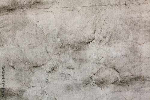 Grunge concrete cement wall with crack in industrial building, great for your...