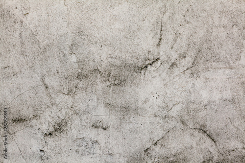 Grunge concrete cement wall with crack in industrial building, great for your...