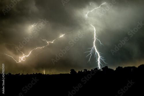 A forked lightning bolt strikes down on the Great Plains in Nebraska, USA.