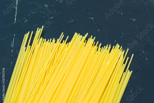 spaghetti italian on a black background close-up
