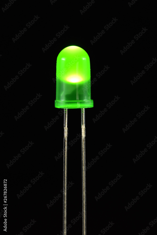 Green luminous LED on the black background Green luminous LED on the black background