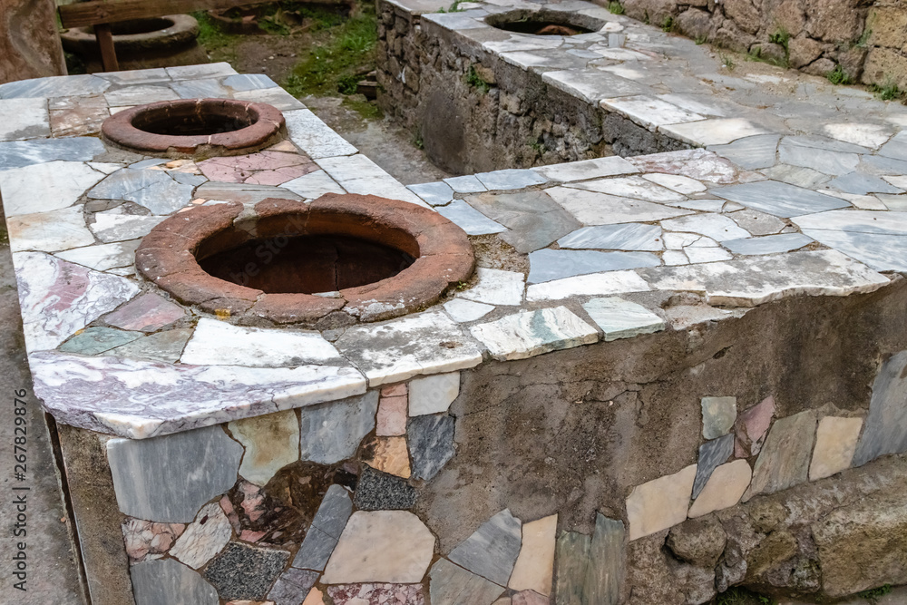 Herculaneum, Campania, Italy - April 21, 2019: The remains of Herculaneum after the eruption of Vesuvius in 79 AD Herculaneum, Campania, Italy - April 21, 2019: The remains of Herculaneum after the eruption of Vesuvius in 79 AD
