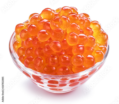 Red caviar in the bowl on white background.