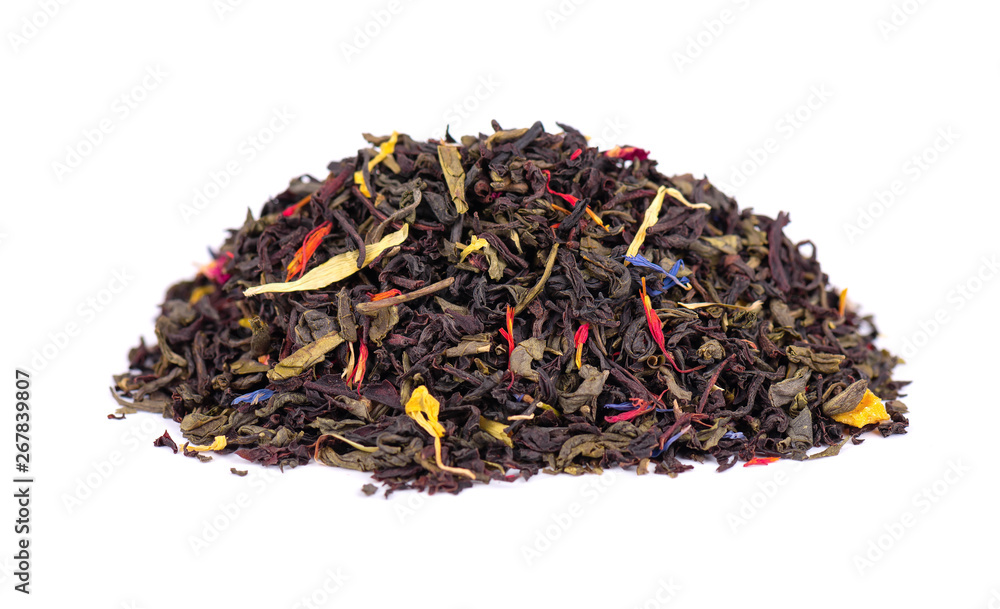 Black and green Ceylon tea with dry flowers - calendula, rose and cornflower petals, isolated on white background. Close up. Black and green Ceylon tea with dry flowers - calendula, rose and cornflower petals, isolated on white background. Close up.