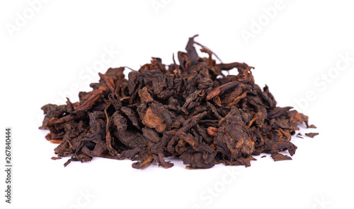Chinese tea Shou Puer. Pressed fermented Pu-erh tea. Macro close up. Aromatic black puer tea. Healthy drink.