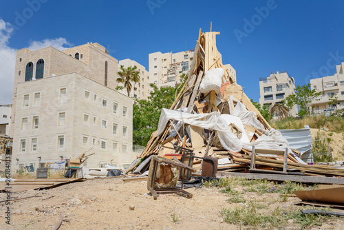 Pile of wooden board ready on festive Lag Baomer bonfires in a orthodox suburb of Jerusalem Israel. photo